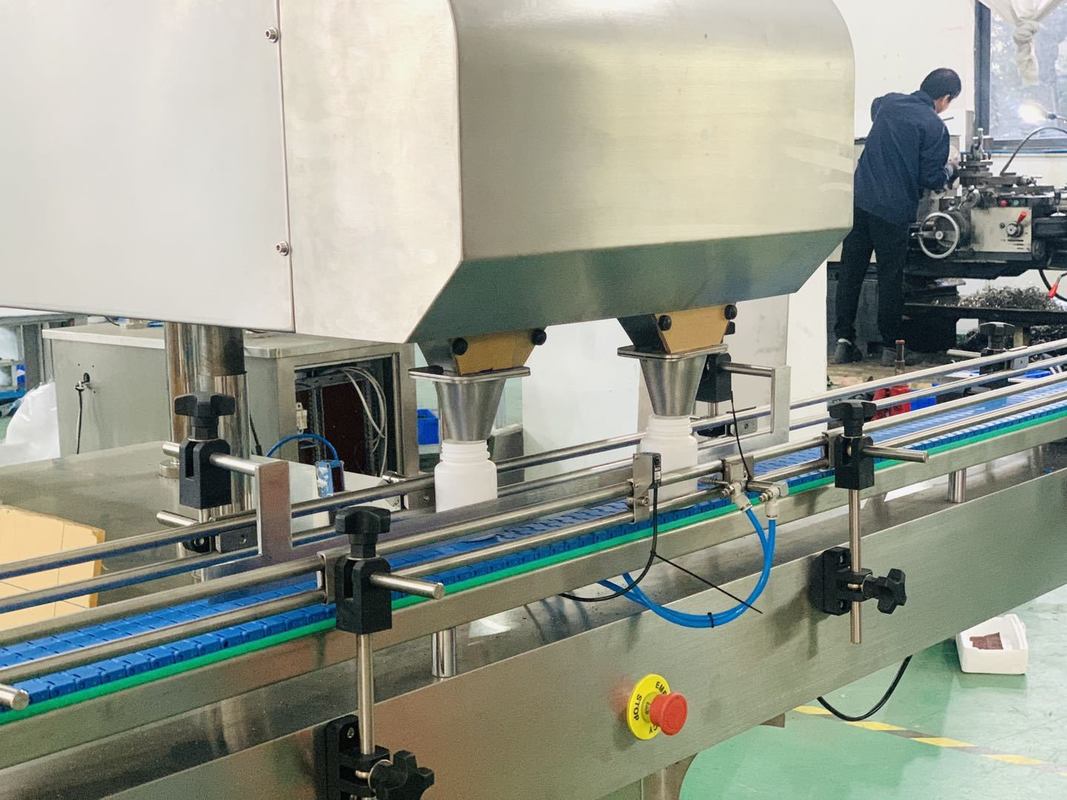 Maszyna do liczenia i napełniania pojemników o wydajności 10-120 butelek/minutę, waga maszyny kg 320