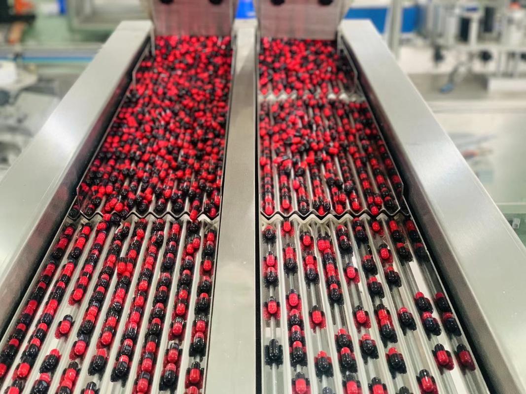 Maszyna do liczenia i napełniania pojemników o wydajności 10-120 butelek/minutę, waga maszyny kg 320